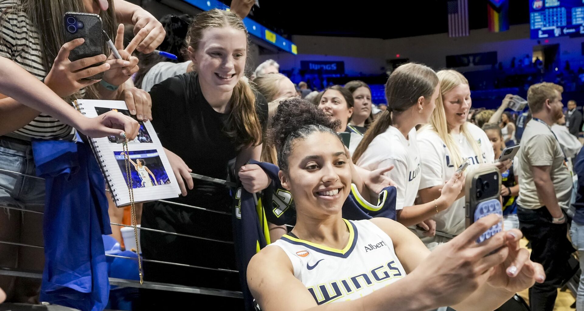 Dallas Wings guard Paige Bueckers walks the orange carpet during WNBA Live All-Star 2026 in Chicago, Thursday, July 23, 2026. (AP Photo/Paul Beaty)