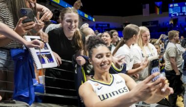 Dallas Wings guard Paige Bueckers walks the orange carpet during WNBA Live All-Star 2026 in Chicago, Thursday, July 23, 2026. (AP Photo/Paul Beaty)