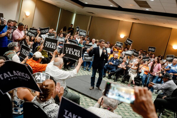 Attendees listen as Democratic Senate candidate James Talarico speaks at a rally on Monday, July 13, 2026, in Eagle Pass, Texas. (AP Photo/Brenda Bazán)