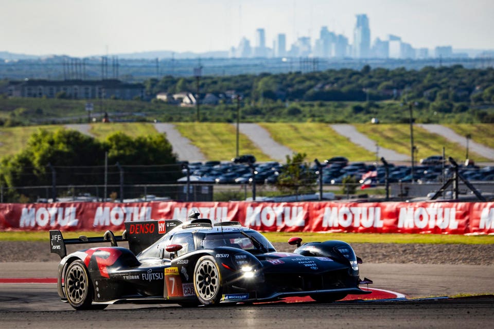 Toyota Hypercar overlooking the Austin skyline at Lone Star Le Mans.