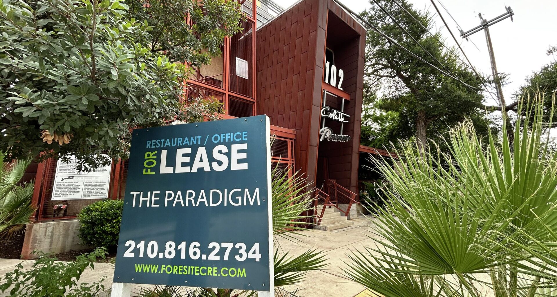 A for lease sign outside of the building at 102 9th St. in downtown San Antonio.