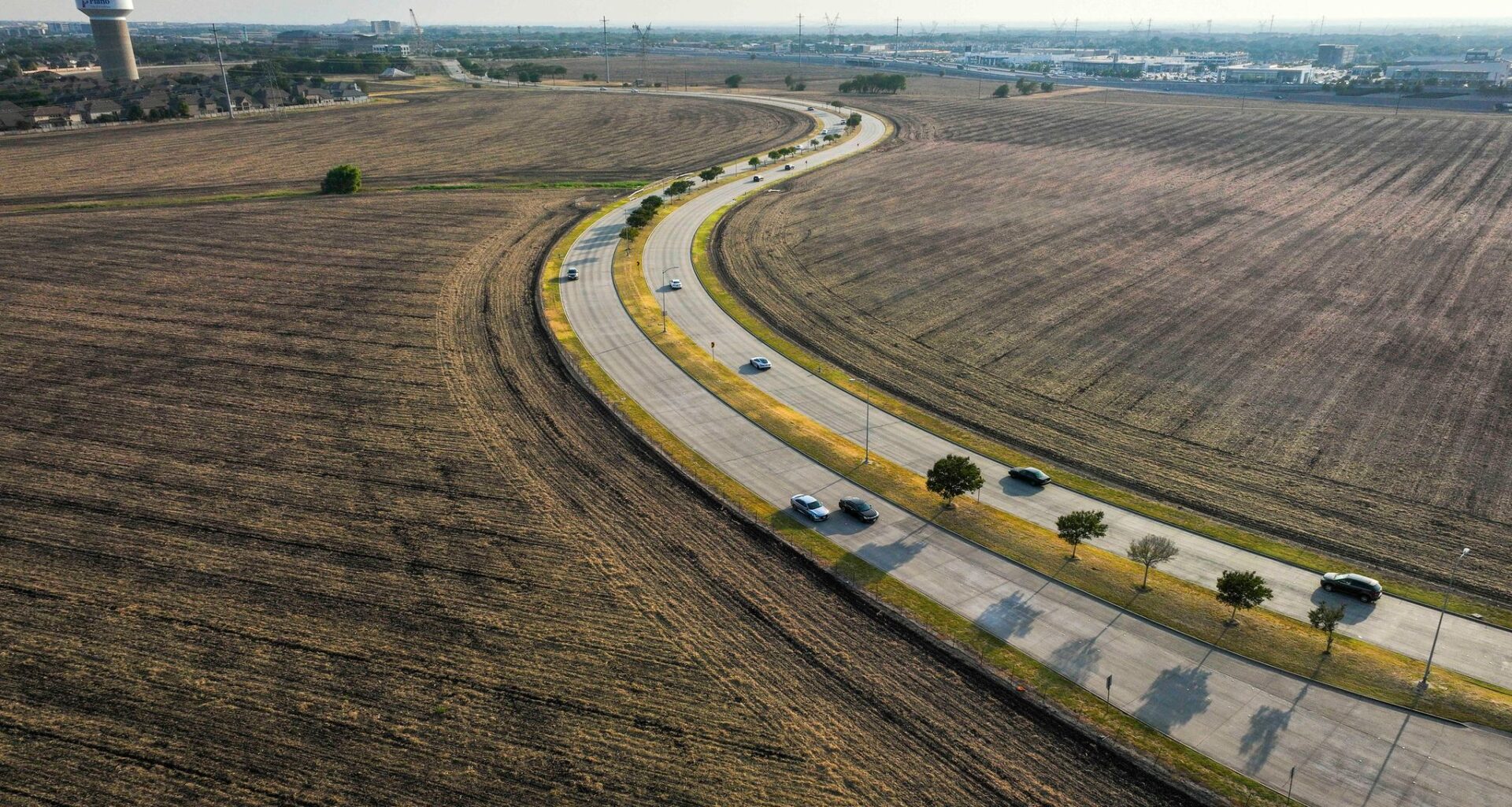 Aerial view looking toward the south of Parkwood Boulevard (running from top left to bottom right) toward Spring Creek Parkway on Monday, Aug. 21, 2023, in Plano. 