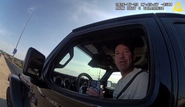 Screen shot from body cam footage capturing former Dallas Cowboys quarterback and CBS analyst Tony Romo's arrest in Wisconsin. 