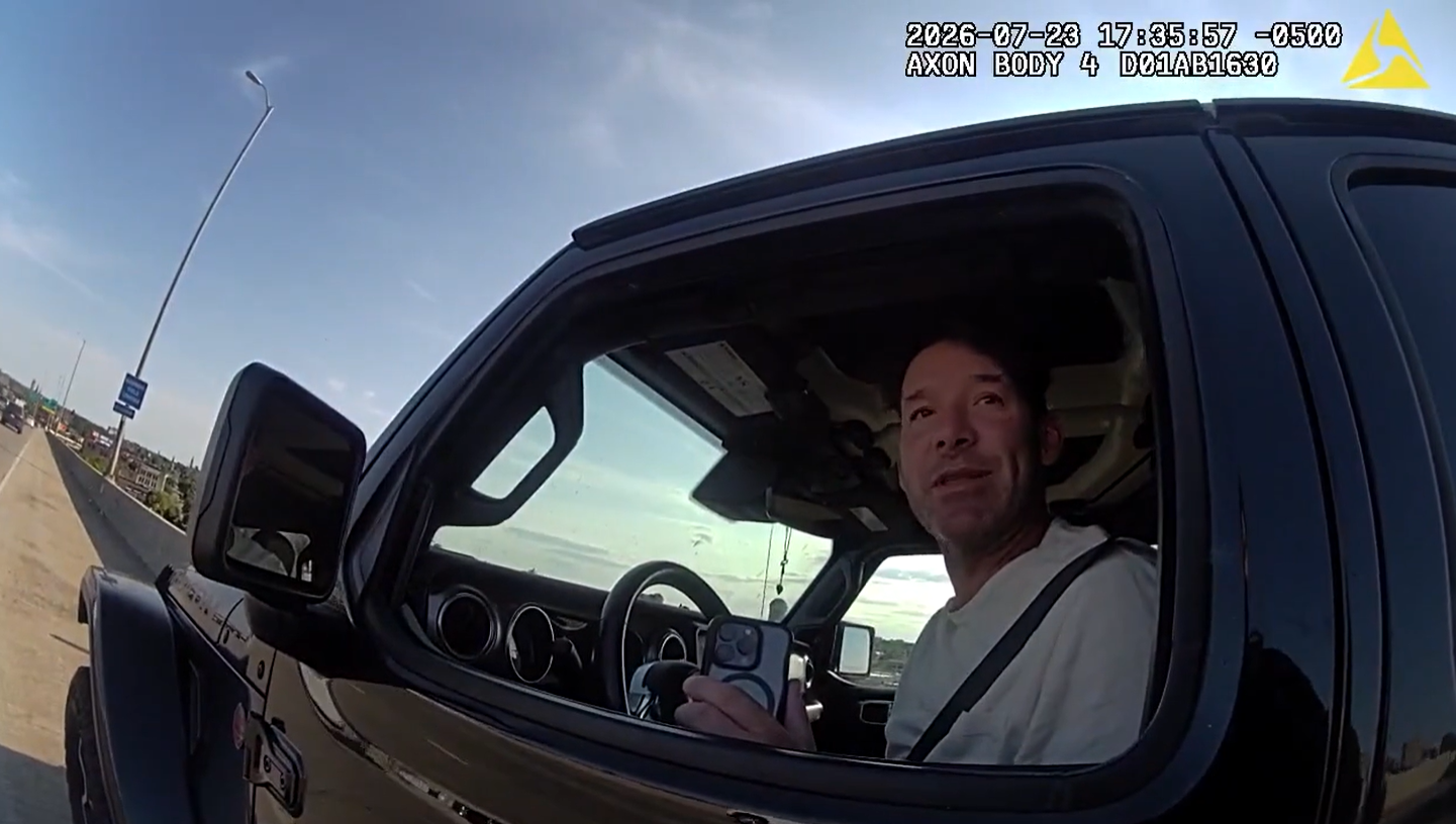 Screen shot from body cam footage capturing former Dallas Cowboys quarterback and CBS analyst Tony Romo's arrest in Wisconsin. 