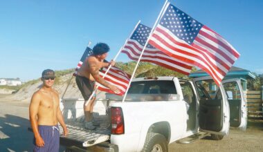 Flag fliers - Port Aransas South Jetty