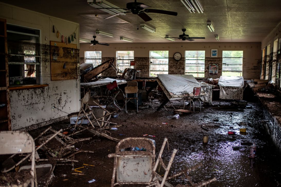 Furniture lie scattered inside a cabin at Camp Mystic after deadly flooding in Kerr County, Texas, on July 5, 2025.