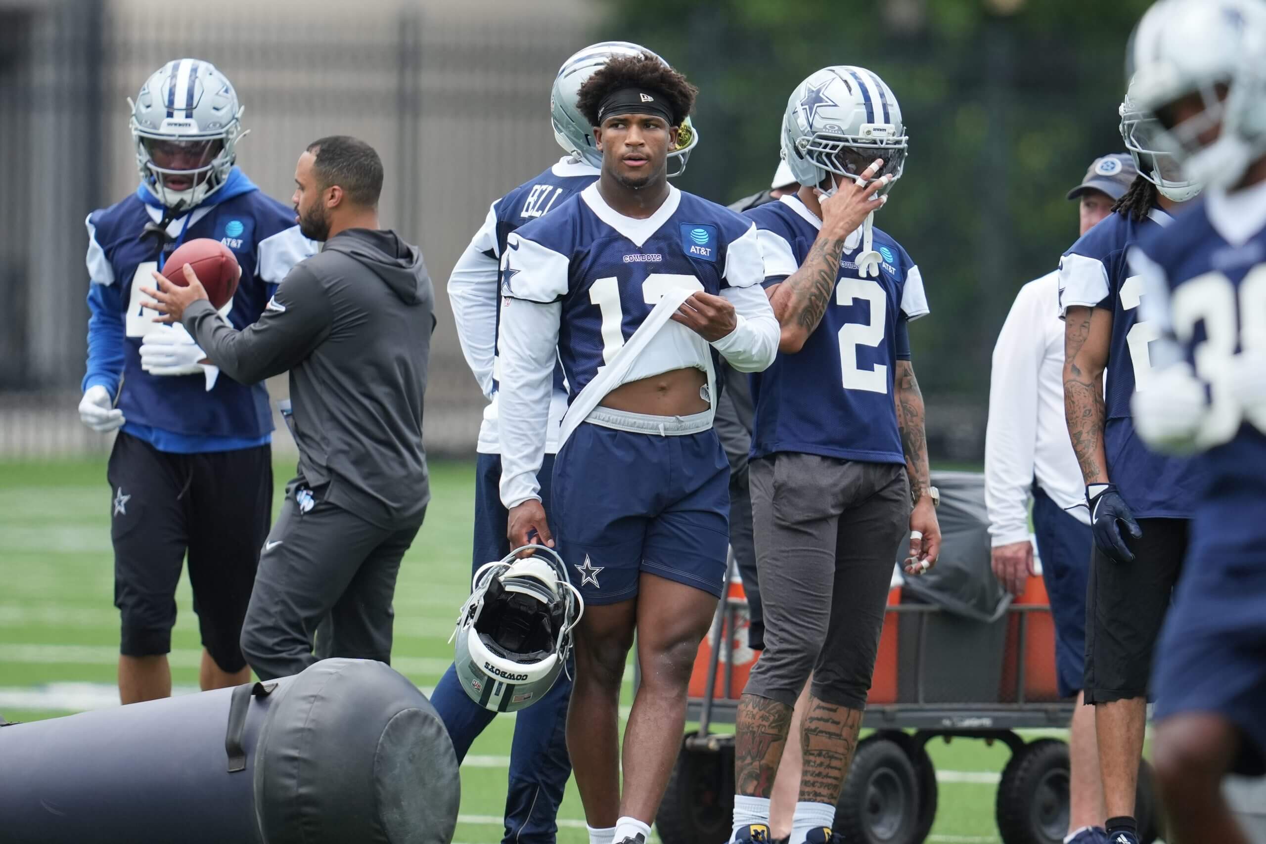 Dallas Cowboys safety Caleb Downs (13) takes a break during practice at the Ford Center at the Star Training Facility in Frisco, Texas.