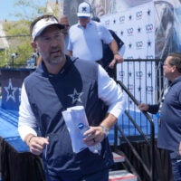Jul 28, 2026; Oxnard, CA, USA; Dallas Cowboys coach Brian Schottenheimer at training camp opening press conference at River Ridge Playing Fields.