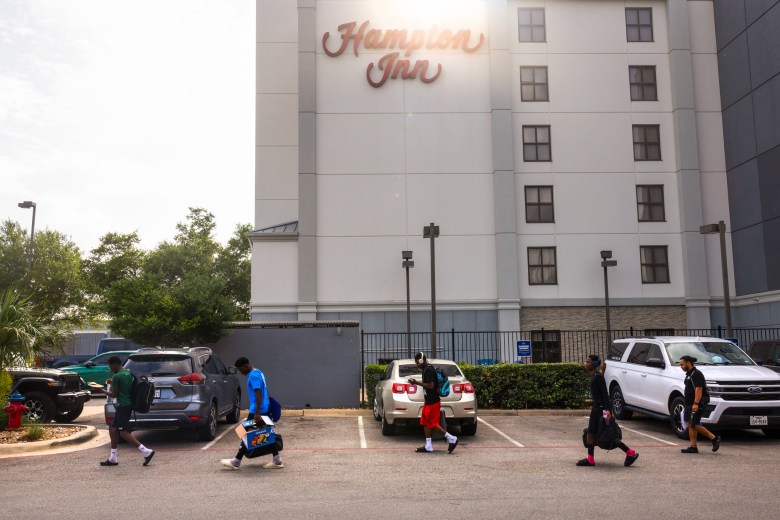 The reVision leave their hotel before they head out to play the regional final of the US Youth Soccer Presidents Cup, on June 14, 2026, in Round Rock. (Antranik Tavitian for The Texas Tribune)