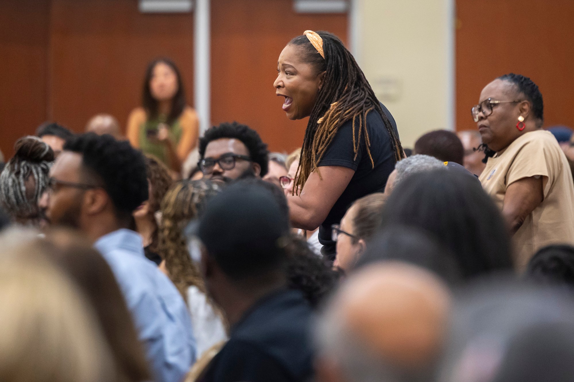 Kandice Webber asks for a chance to question U.S. Senate candidate James Talarico during a town hall meeting at Kingdom Builders Center on Sunday, July 19, 2026, in Houston.