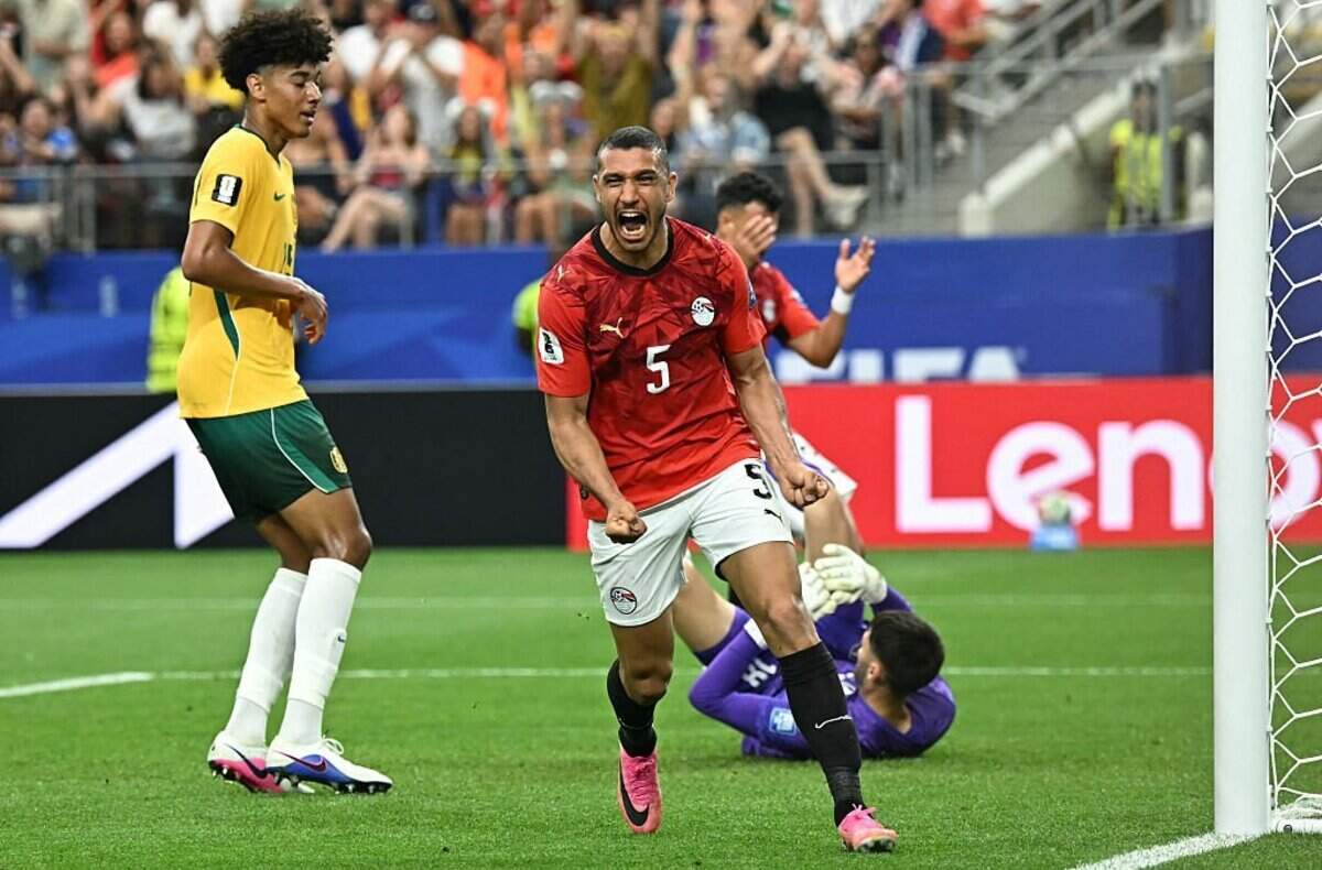 Egypt's defender #05 Ramy Rabia reacts after missing a goal opportunity during the 2026 World Cup round of 32 football match between Australia and Egypt at the Dallas Stadium in Arlington on July 3, 2026. (Photo by Paul ELLIS / AFP via Getty Images)