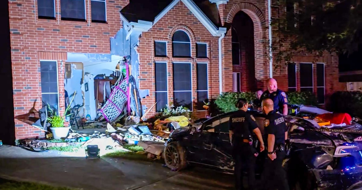 Tesla driver charged with manslaughter over crash into Texas home