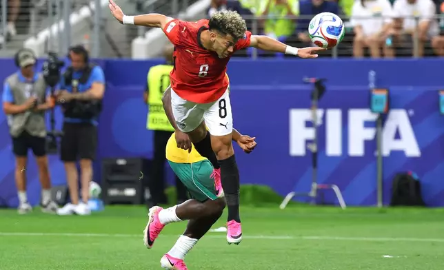 Egypt's Emam Ashour (8) scores their first goal during the World Cup round of 32 soccer match between Australia and Egypt in Arlington, Texas, near Dallas, Friday, July 3, 2026. (AP Photo/Gareth Patterson)