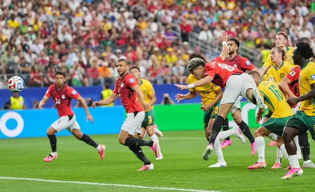 Egypt's Emam Ashour scores the opening goal during a World Cup round of 32 soccer match between Australia and Egypt in Arlington, Texas, near Dallas, Friday, July 3, 2026. (AP Photo/Julio Cortez)