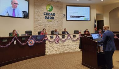 Chief Economic Development Officer Arthur Jackson discusses a deal between the city and construction supply company Texas Materials at the June 25 Cedar Park City Council meeting. (Daniel Schwalm/Community Impact)