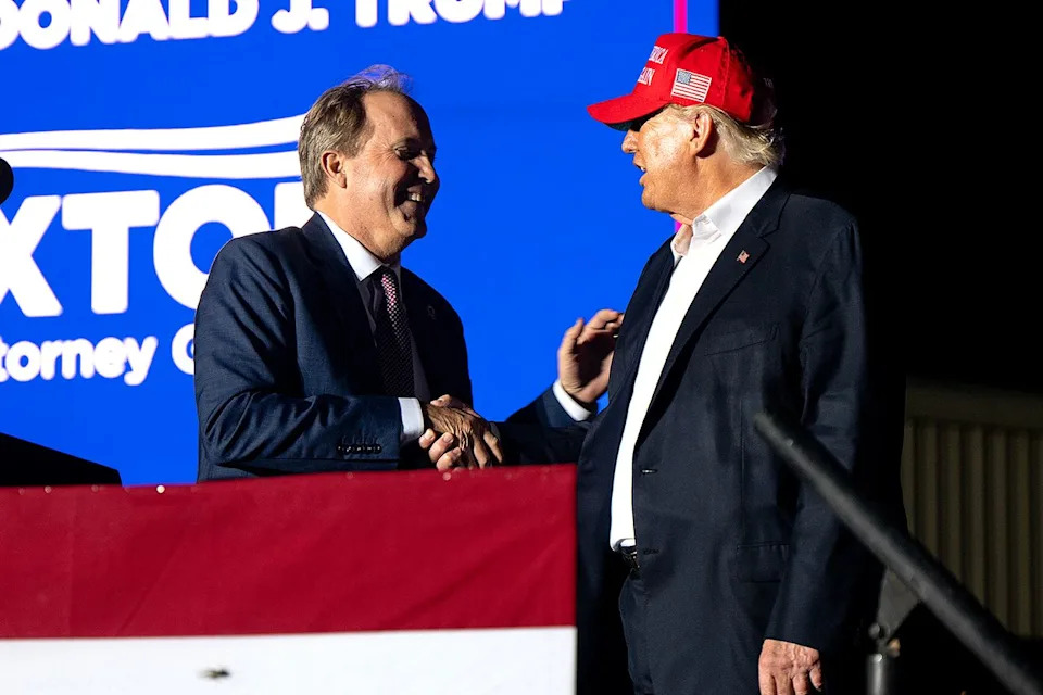 Texas Attorney General Ken Paxton greets President Donald Trump at the ‘Save America’ rally in Robstown, Texas, on Oct. 22, 2022Credit: Brandon Bell/Getty