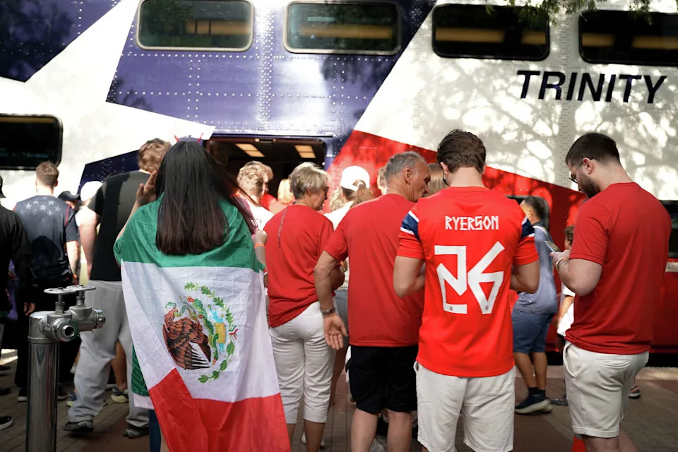 Fans board a train at Victory Station to Dallas Stadium ahead of a World Cup match on Tuesday, June 30 in Dallas. (Joe Snell/The Dallas Morning News)