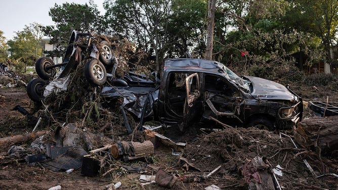 Debris lays along the Guadalupe River after it was swept up in the flash flooding on July 8, 2025 in Ingram, Texas.