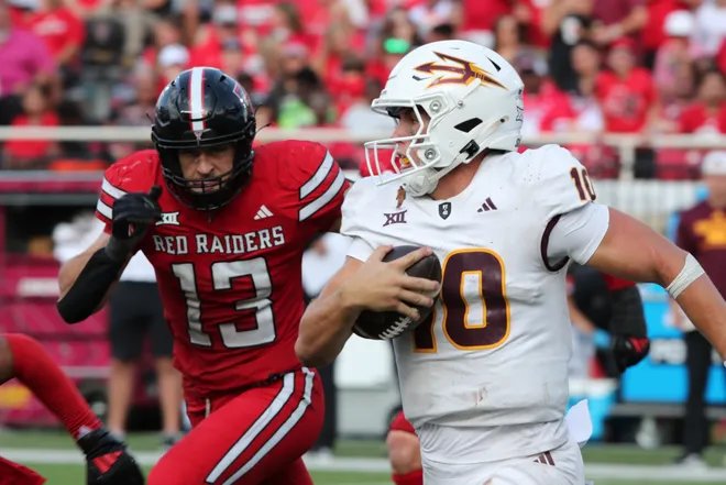 Texas Tech Red Raiders defensive back Ben Roberts (13) pressures Arizona State Sun Devils quarterback Sam Leavitt (10) in the second half at Jones AT&T Stadium and Cody Campbell Field in Lubbock, Texas on Sept. 21, 2024.