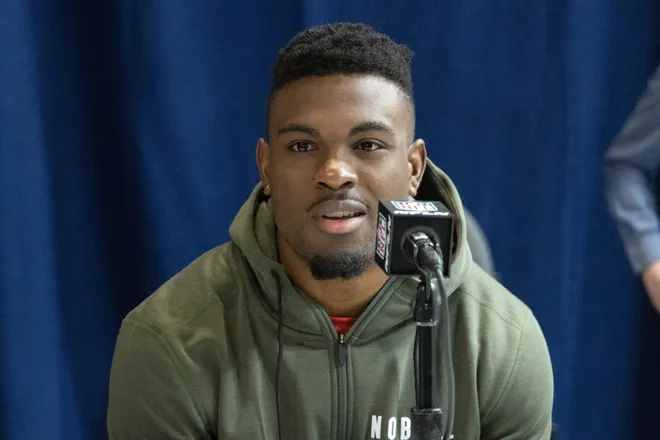 Mar 3, 2023; Indianapolis, IN, USA; Mississippi wide receiver Jonathan Mingo (WO35) speaks to the press at the NFL Combine at Lucas Oil Stadium. Mandatory Credit: Trevor Ruszkowski-USA TODAY Sports