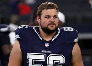 Aug 24, 2024; Arlington, Texas, USA; Dallas Cowboys guard Cooper Beebe (56) walks off the field after the game against the Los Angeles Chargers at AT & T Stadium. Mandatory Credit: Tim Heitman-USA TODAY Sports