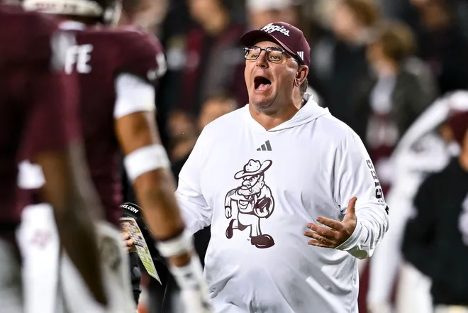 Nov 30, 2024; College Station, Texas, USA; Texas A&M Aggies head coach Mike Elko reacts during the second half against the Texas Longhorns. The Longhorns defeated the Aggies 17-7. at Kyle Field. Mandatory Credit: Maria Lysaker-Imagn Images