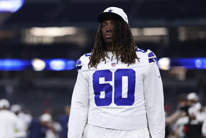 ARLINGTON, TEXAS - AUGUST 22: Tyler Guyton #60 of the Dallas Cowboys walks off the field after the NFL Preseason 2025 game against the Atlanta Falcons at AT&T Stadium on August 22, 2025 in Arlington, Texas. (Photo by Sam Hodde/Getty Images)