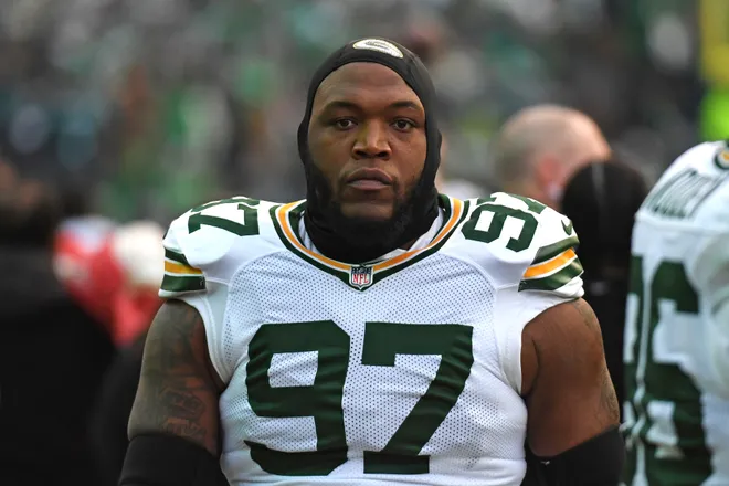 Jan 12, 2025; Philadelphia, Pennsylvania, USA; Green Bay Packers defensive tackle Kenny Clark (97) against the Philadelphia Eagles in an NFC wild card game at Lincoln Financial Field. Mandatory Credit: Eric Hartline-Imagn Images