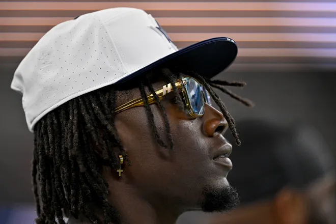 Aug 16, 2025; Arlington, Texas, USA; Dallas Cowboys linebacker DeMarvion Overshown (0) looks on before the game between the Dallas Cowboys and the Baltimore Ravens at AT&T Stadium. Mandatory Credit: Jerome Miron-Imagn Images