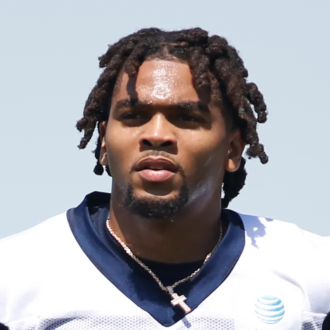 May 14, 2022; Frisco, Texas, USA; Dallas Cowboys runningback Malik Davis (34) runs off the field during practice at the Ford Center at the Star Training Facility in Frisco, Texas. Mandatory Credit: Tim Heitman-USA TODAY Sports