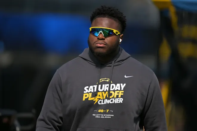 Oct 5, 2025; Inglewood, California, USA; Los Angeles Chargers defensive tackle Otito Ogbonnia (93) walks on the field prior to the game against the Washington Commanders at SoFi Stadium. Mandatory Credit: Jayne Kamin-Oncea-Imagn Images