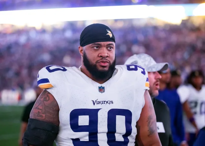Jan 13, 2025; Glendale, AZ, USA; Minnesota Vikings defensive lineman Jonathan Bullard (90) against the Los Angeles Rams during an NFC wild card game at State Farm Stadium. Mandatory Credit: Mark J. Rebilas-Imagn Images
