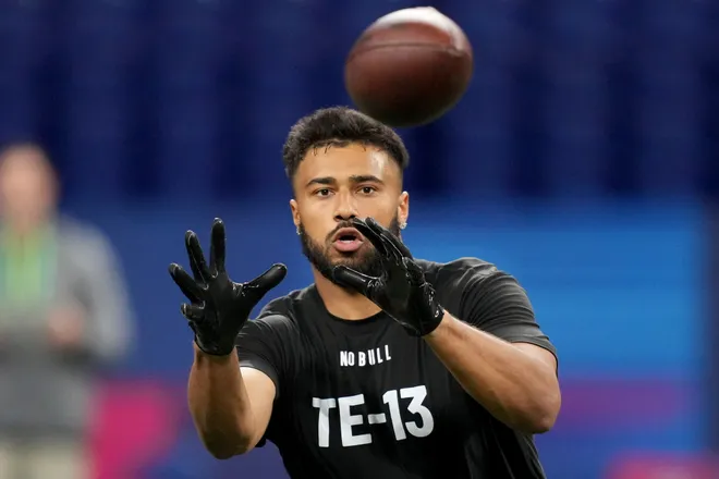 Mar 1, 2024; Indianapolis, IN, USA; Minnesota tight end Brevyn Spann-Ford (TE13) works out during the 2024 NFL Combine at Lucas Oil Stadium. Mandatory Credit: Kirby Lee-USA TODAY Sports