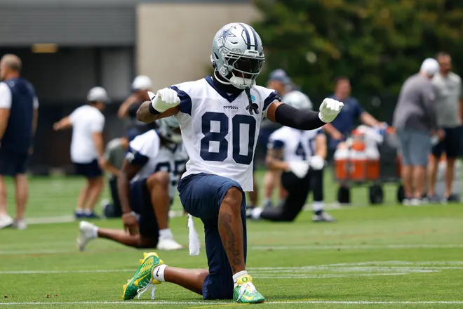 Jun 16, 2026; Dallas, TX, USA; Dallas Cowboys wide receiver Traeshon Holden (80) stretches before practice at the Ford Center at the Star Training Facility in Frisco, Texas. Mandatory Credit: Chris Jones-Imagn Images