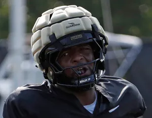 Purdue Boilermakers offensive lineman DJ Wingfield (55) reacts after running a drill Wednesday, Aug. 21, 2024, during Purdue football practice at Bimel Outdoor Practice Complex in West Lafayette, Ind.