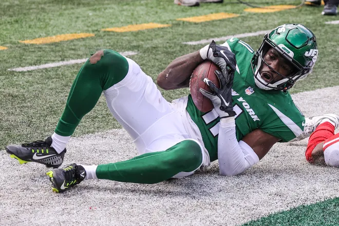 Aug 28, 2022; East Rutherford, New Jersey, USA; New York Jets wide receiver Denzel Mims (11) catches the ball for a touchdown in the second half against the New York Giants at MetLife Stadium. Mandatory Credit: Wendell Cruz-USA TODAY Sports