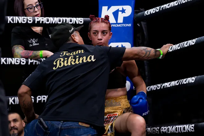 El Paso flyweight Nayeli Rodriguez listens to instructions from her father and trainer in her corner during her bout against Katherine Lindenmuth during Kings Promotions' Ring Wars 23 boxing card at the El Paso County Coliseum on Saturday, July 18, 2026.