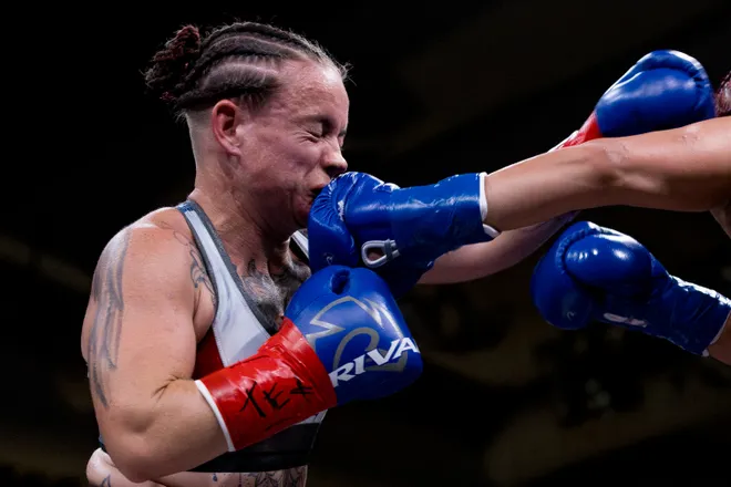Katherine Lindenmuth takes a punch from El Paso flyweight Nayeli Rodriguez during Kings Promotions' Ring Wars 23 boxing card at the El Paso County Coliseum on Saturday, July 18, 2026.