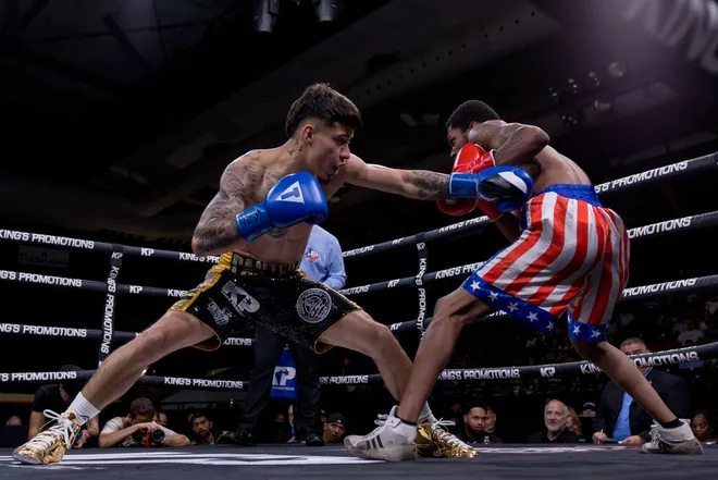 El Paso super featherweight Pedro Rodarte, left, punches Fort Worth's Davion Edwards during Kings Promotions' Ring Wars 23 boxing card at the El Paso County Coliseum on Saturday, July 18, 2026. Rodarte won by first-round knockout.