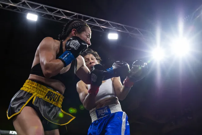 Dallas bantamweight Alexis Araiza Mones, left, punches Crystal Hoy, of Las Vegas, during Kings Promotions' Ring Wars 23 boxing card at the El Paso County Coliseum on Saturday, July 18, 2026. Mones won the first fight of the night with a four-round decision over Hoy.