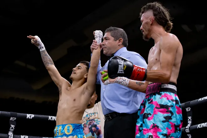 Las Cruces super flyweight D'Angelo Sanchez, left, has his hand raised after defeating Austin Lewis by first-round stoppage during Kings Promotions' Ring Wars 23 at the El Paso County Coliseum on Saturday, July 18, 2026.