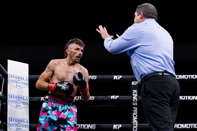 A referee counts over Austin Lewis after a first-round knockdown by Las Cruces super flyweight D'Angelo Sanchez during Kings Promotions' Ring Wars 23 at the El Paso County Coliseum on Saturday, July 18, 2026. Sanchez won by first-round stoppage at 2:08.