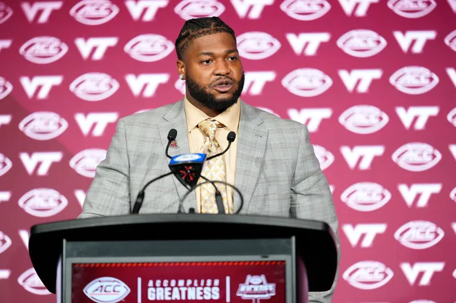 Jul 24, 2025; Charlotte, NC, USA; Virginia Tech defensive linebacker Kelvin Gilliam Jr.answers questions from the media during ACC Media Days at Hilton Charlotte Uptown. Mandatory Credit: Jim Dedmon-Imagn Images