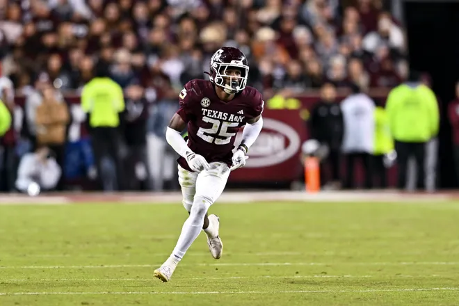 Nov 30, 2024; College Station, Texas, USA; Texas A & M Aggies defensive back Dalton Brooks (25) runs a route during the second half against the Texas Longhorns. The Longhorns defeated the Aggies 17-7 at Kyle Field. Mandatory Credit: Maria Lysaker-Imagn Images