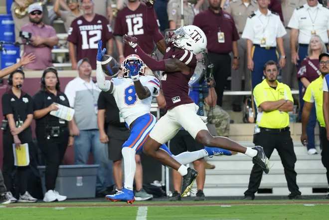 COLLEGE STATION, TEXAS - OCTOBER 11: Vernell Brown III #8 of the Florida Gators makes a catch while defended by Dezz Ricks #2 of Texas A & M during the first half at Kyle Field on October 11, 2025 in College Station, Texas. (Photo by Scott Wachter/Getty Images)