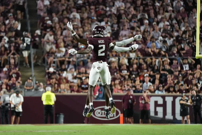 Aug 30, 2025; College Station, Texas, USA; Texas A & M Aggies cornerback Dezz Ricks (2) celebrates during the second half against the UTSA Roadrunners at Kyle Field. Mandatory Credit: Sean Thomas-Imagn Images