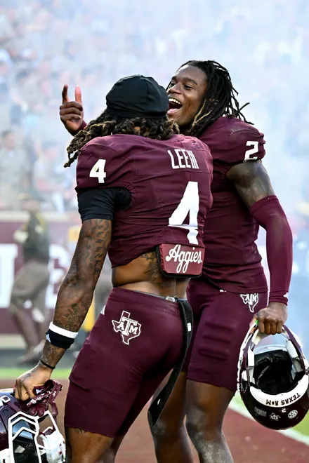 Sep 27, 2025; College Station, Texas, USA; Texas A & M Aggies cornerback Will Lee III (4) and cornerback Dezz Ricks (2) react after the game against the Auburn Tigers at Kyle Field. Mandatory Credit: Maria Lysaker-Imagn Images
