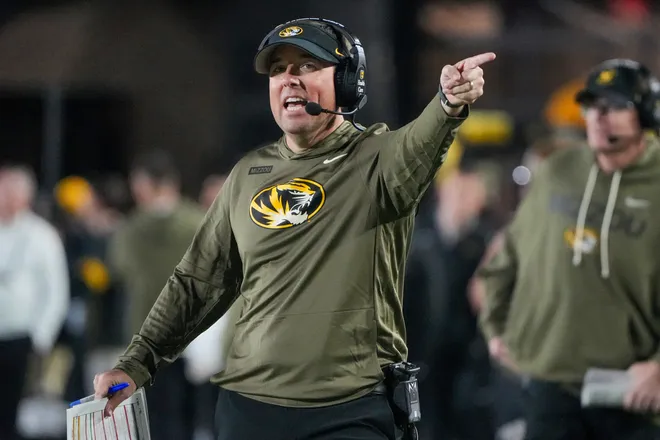 Nov 15, 2025; Columbia, Missouri, USA; Missouri Tigers head coach Eliah Drinkwitz reacts to play against the Mississippi State Bulldogs during the first half of the game at Faurot Field at Memorial Stadium. Mandatory Credit: Denny Medley-Imagn Images