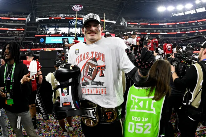 Dec 6, 2025; Arlington, TX, USA; Texas Tech Red Raiders linebacker Ben Roberts (13) poses for a photo after the win against the BYU Cougars at AT & T Stadium. Mandatory Credit: Jerome Miron-Imagn Images