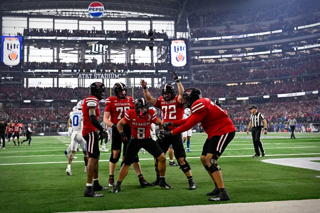 Dec 6, 2025; Arlington, TX, USA; Texas Tech Red Raiders running back Cameron Dickey (8) celebrates a touchdown with his teammates during the game between the Red Raiders and the Cougars at AT & T Stadium. Mandatory Credit: Jerome Miron-Imagn Images